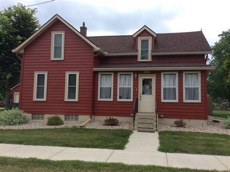 dark brown house with red metal roof|reddish brown roof house colors.